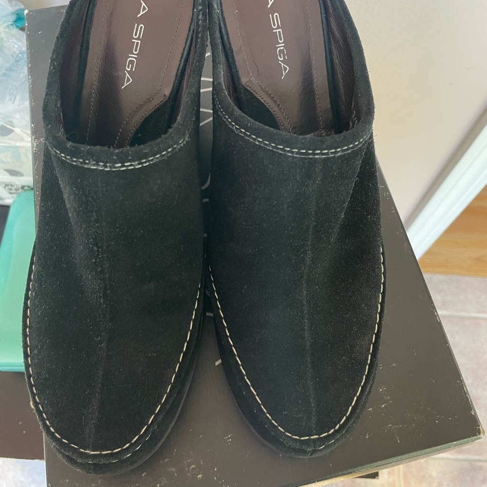 Black platform wedges , size 8,5. Like new , worn once. Very comfortable.
